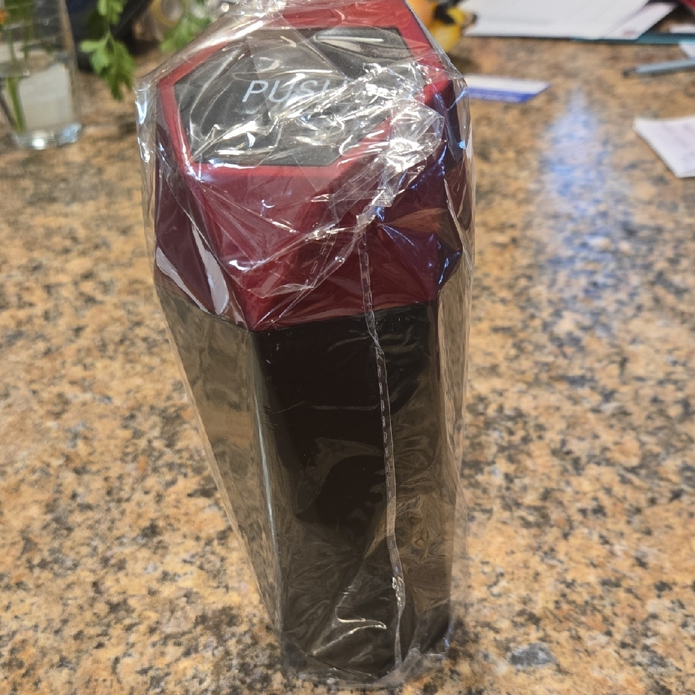 Red and Black Push Button Dispenser